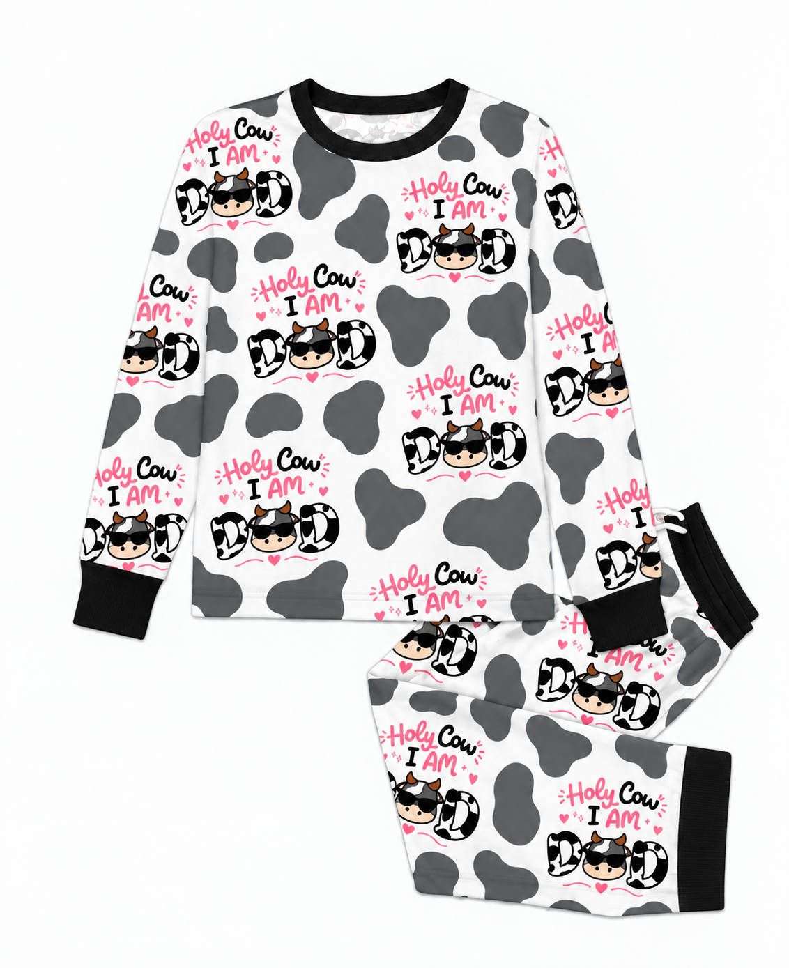 Flat lay of the Holy Cow I'm Dad men's bamboo pajama set, a crew neck top and joggers in grey cow print with black trim