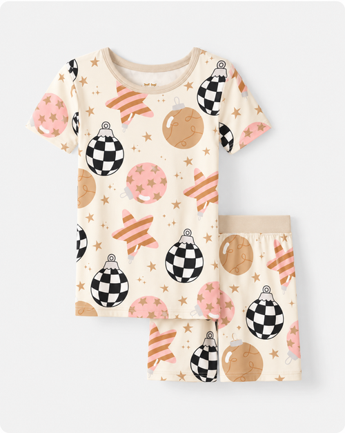 Flat lay of the Merry & Bright short sleeve tee and shorts in cream bamboo, with a beige crew neck and wide beige waistband.